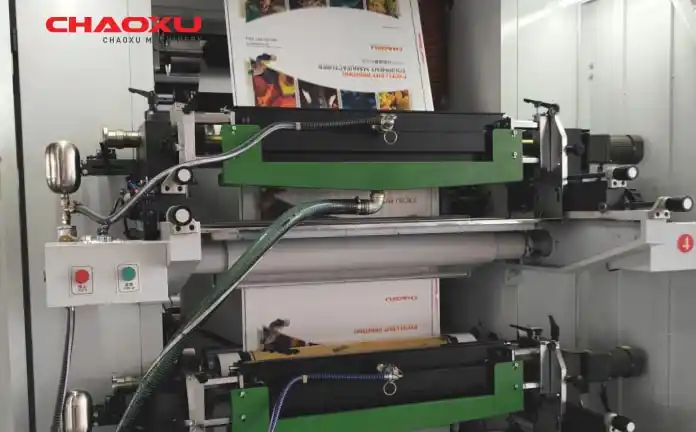Close-up of a servo motor directly coupled to a printing cylinder, with encoder visible